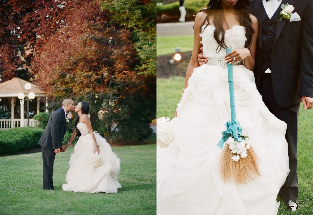 black wedding couple pose with broom